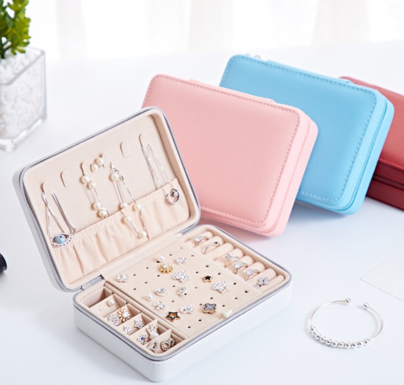 Old-fashioned wooden storage box for jewelry and small items.