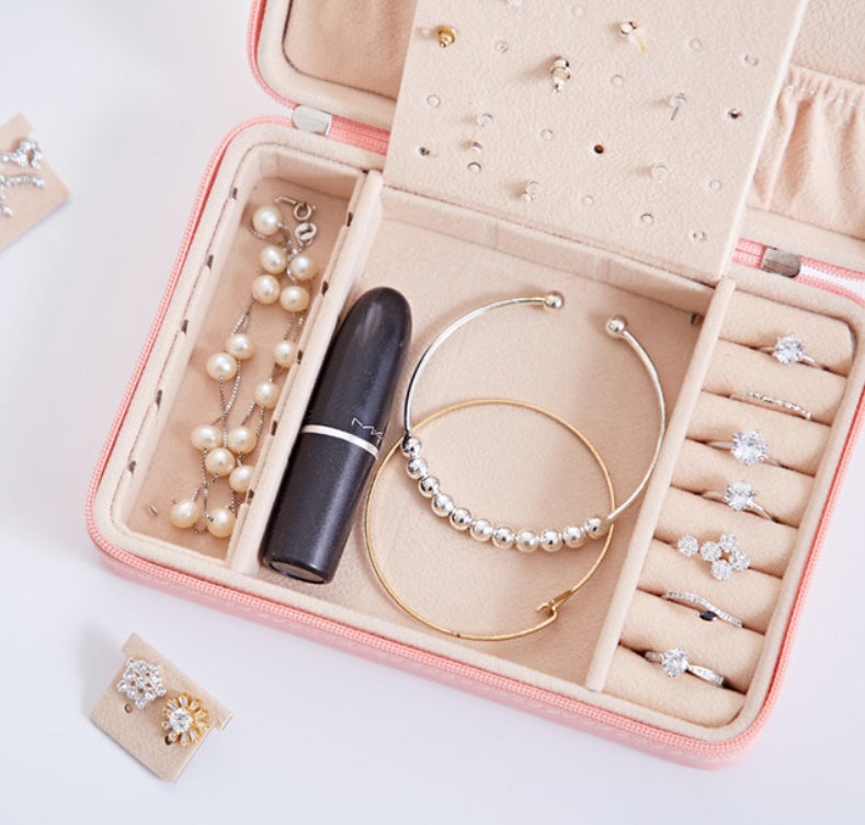 Old-fashioned wooden storage box for jewelry and small items.