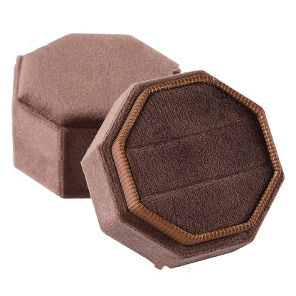 A dual slot leather case for storing watches and jewelry.